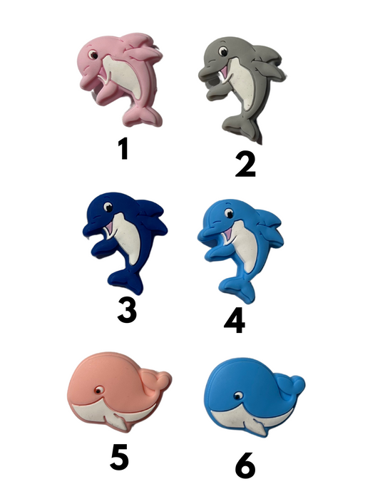 Whales “various styles and colors “