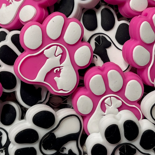 Paw prints with dog outline
